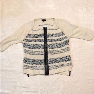 Cream and black zip-front cardigan